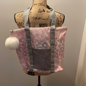 Justice bag. Comes with white pom pom. Color - pink and grey leopard print.